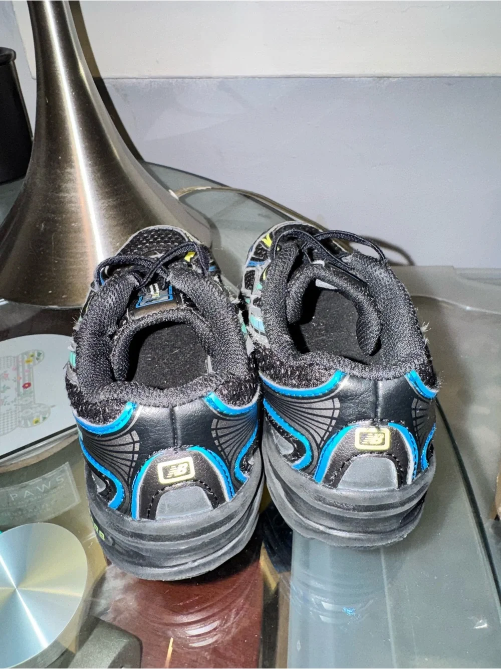 New Balance Kids Black with Blue & Silver Accent Sneakers